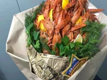 компания по продаже живых и вареных раков, морепродуктов Crabs в Тобольске