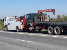 Выездная техническая помощь на дороге Служба эвакуации грузовых автомобилей в Абакане